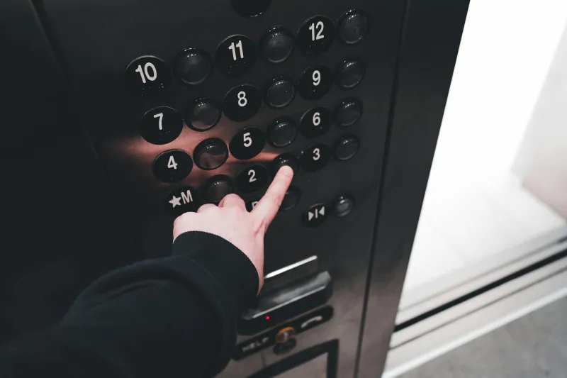 The Button That Never Worked: America's Most Persistent Lie Is in Every Elevator